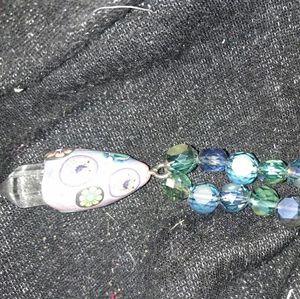 Crystal necklace with paulmore Clay center crystal